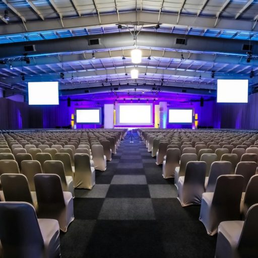 rows-of-empty-chairs-in-the-large-conference-hall-for-corporate-convention-or-lecture.jpg